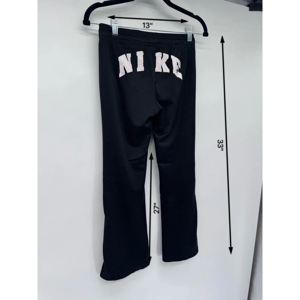 Nike girl M mesh lined snap side back logo flare pants athletic Y2K 90s preppy